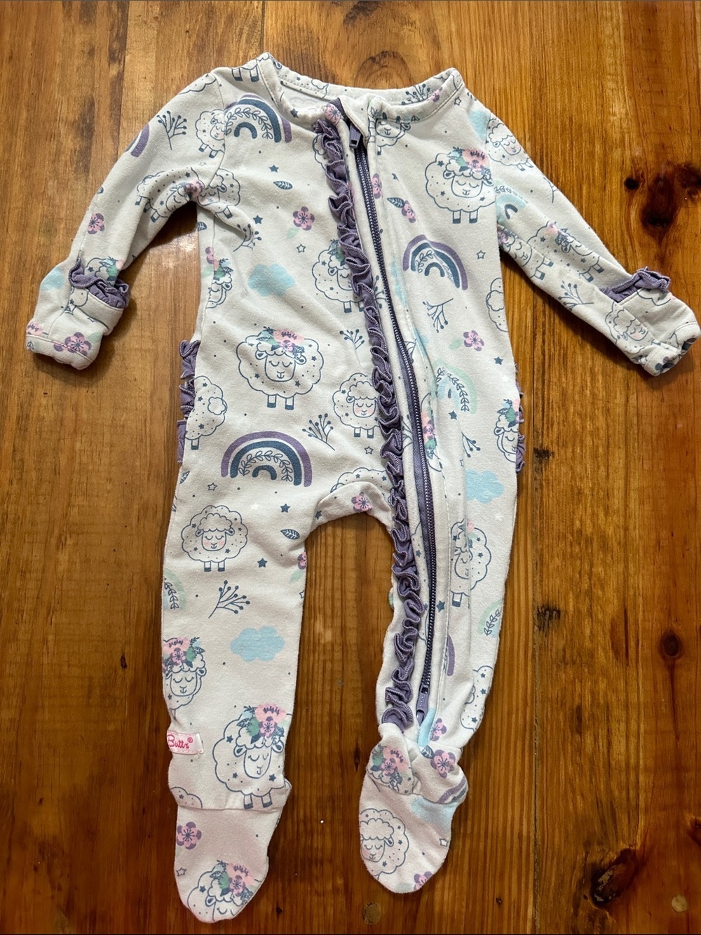 Ruffle Butts Baby Girls Footed One-Piece in Lavender Lambs Rainbow & Cloud Print